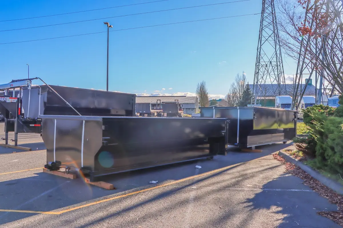 Roll-off dumpster ready for waste disposal at job site for Construction Dumpster Rental in Clay